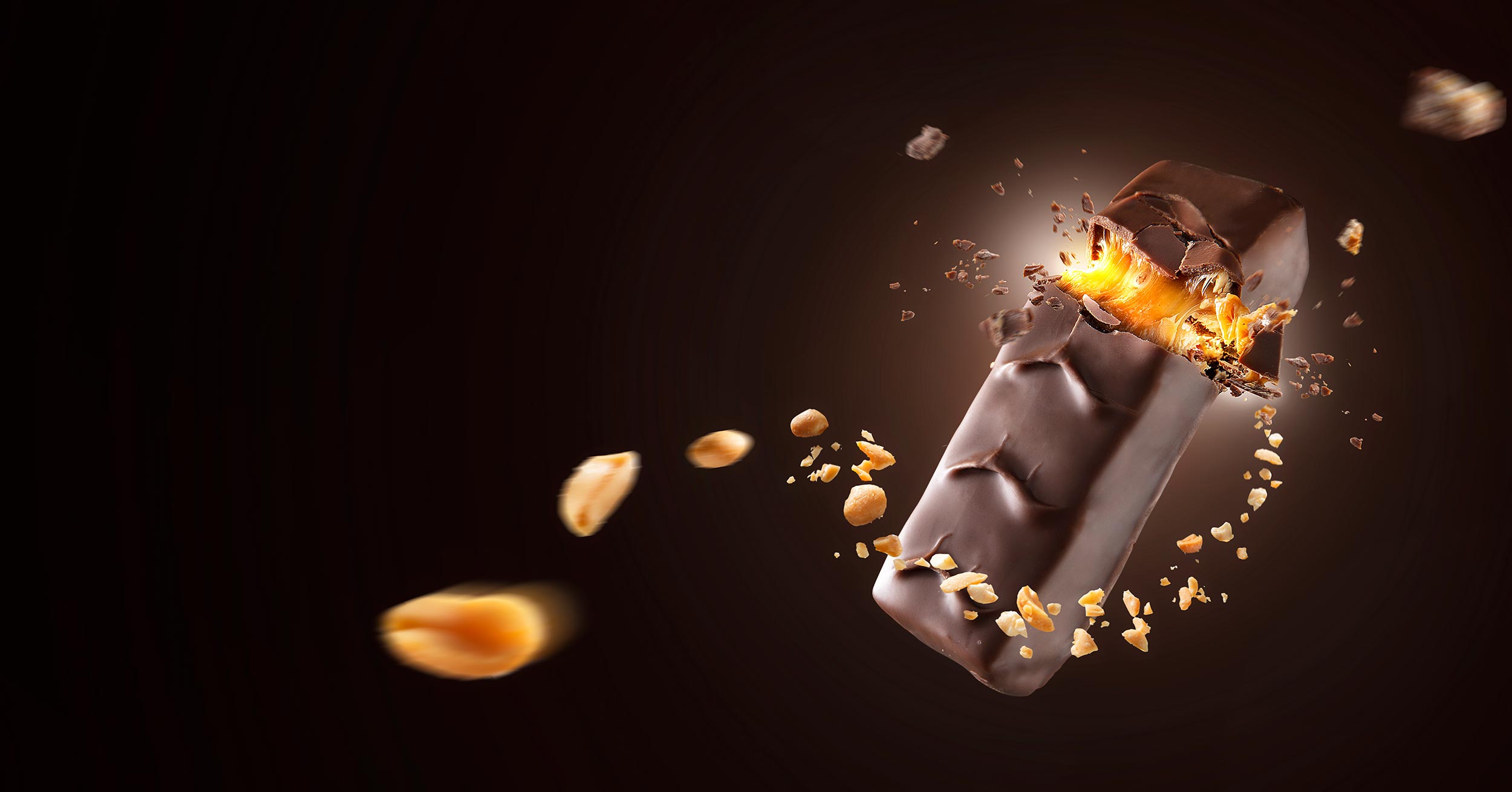 Produktfotograf - Inszenierung eines Snickers in einem aufwendigen Produktfoto